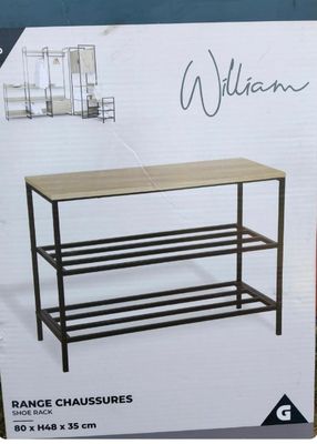 the box of a shoe rack with a shelf underneath it