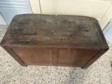 an old wooden chest sitting on the floor