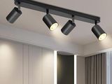 Luminaire sur rail noir à trois spots, avec variateur et télécommande