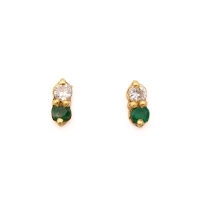 a pair of emerald and diamond earrings