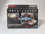 the monopoly game has a box and instructions for it to play