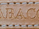 an image of a close up of a leather label on a bag