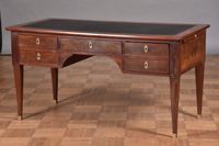 Bureau double face en acajou et placage d'acajou, ouvrant en…