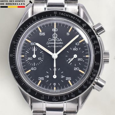 an image of a close up of a watch on a white surface