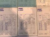 many papers that are on a table with a calculator and a calculator
