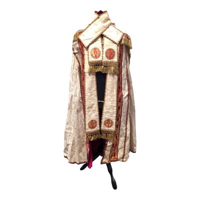 an image of a white robe with a red and gold trim