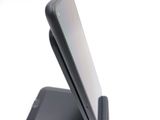 a cell phone that is sitting on top of a stand