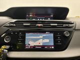 a picture of a car dashboard with a digital display