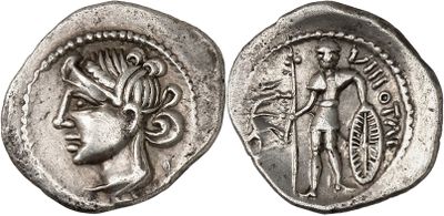 a silver coin with a woman and a man on it