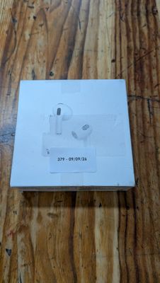 a box with a pair of earphones on it