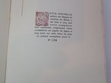 an open book with a picture of a stamp on it