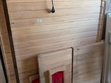 several pieces of wood are stacked on top of each other in a room