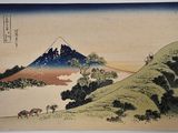 une image représentant un tableau d'une montagne avec des chevaux au premier plan