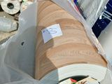 a picture of a large roll of paper on a carton
