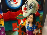 tableau représentant un clown et une femme devant un chapiteau de cirque