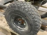 a tire that is sitting on a pallet