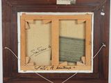 an old picture of a picture frame with a piece of paper attached to it