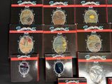 a lot of different types of watches on display
