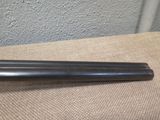 a pair of black metal rods sitting on top of a table