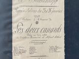 an old document with writing on it sitting on top of a table