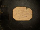 a label on the back of a suitcase that says r p r bruxellies