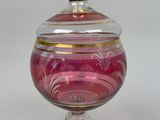 pink and gold glass covered bowl with gold lid