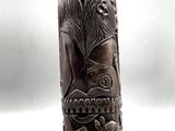 an image of a wooden carving of a lion