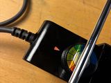an image of a cell phone plugged into a charger