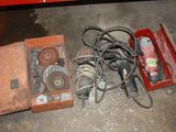 a red box with some electrical equipment on the floor