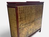 an image of a wooden cabinet on wheels