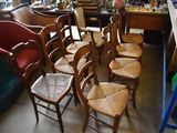 a lot of chairs that are sitting in a room