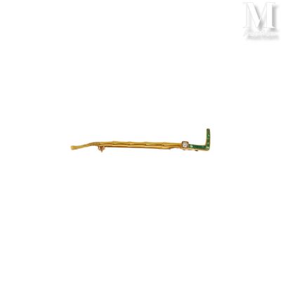 une image représentant une brosse à dents verte et dorée sur fond blanc