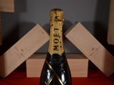 a bottle of champagne that is sitting on a table