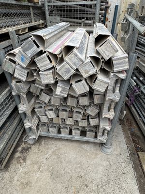 a large pile of newspapers sitting on a pallet