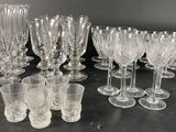 a lot of empty wine glasses on the table