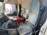 a view of the inside of a van with the driver ' s seat up