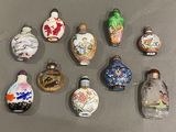 a lot of small bottles that are sitting on a table