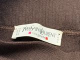 the label on the back of a brown sweater reads yescannabrent