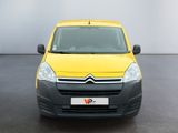yellow citrole van parked in front of a white wall