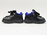 a pair of black and blue hiking shoes on a white background