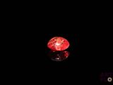 an image of a red diamond on a black surface