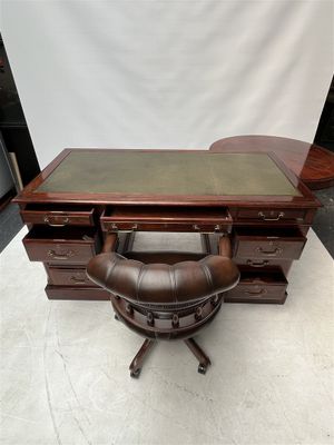 an image of a desk with a chair in front of it