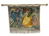 une image représentant une tapisserie accrochée à un mur et sur laquelle figure un tableau
