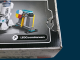 a box with a lego star wars r2d2 and r2 - d2 set in it