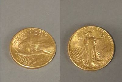 deux vues différentes d'une pièce d'or sur laquelle figure une femme