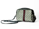 a close up of a purse with a strap on a white background