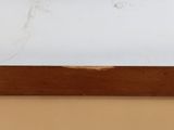 an image of a close up of a piece of wood on a wall