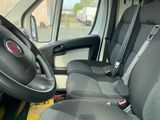 a view of the inside of a van from the driver ' s seat