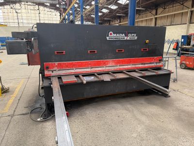 a large machine that is sitting in a warehouse