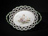 a white plate with a picture of a castle on it